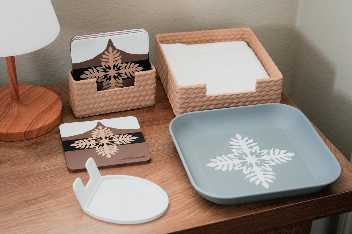 Formi x Little Musubi coasters, lauhala-inspired holders, tray, and spoon rest styled together